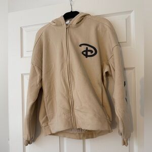 Disney Cream Hoodie with Black Logo